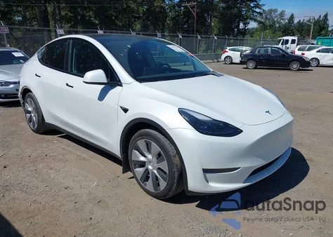 2023 Tesla Model Y Awd/Long Range Dual Motor All-Wheel Drive z USA, uszkodzony, nr VIN 7SAYGAEE1PF700262